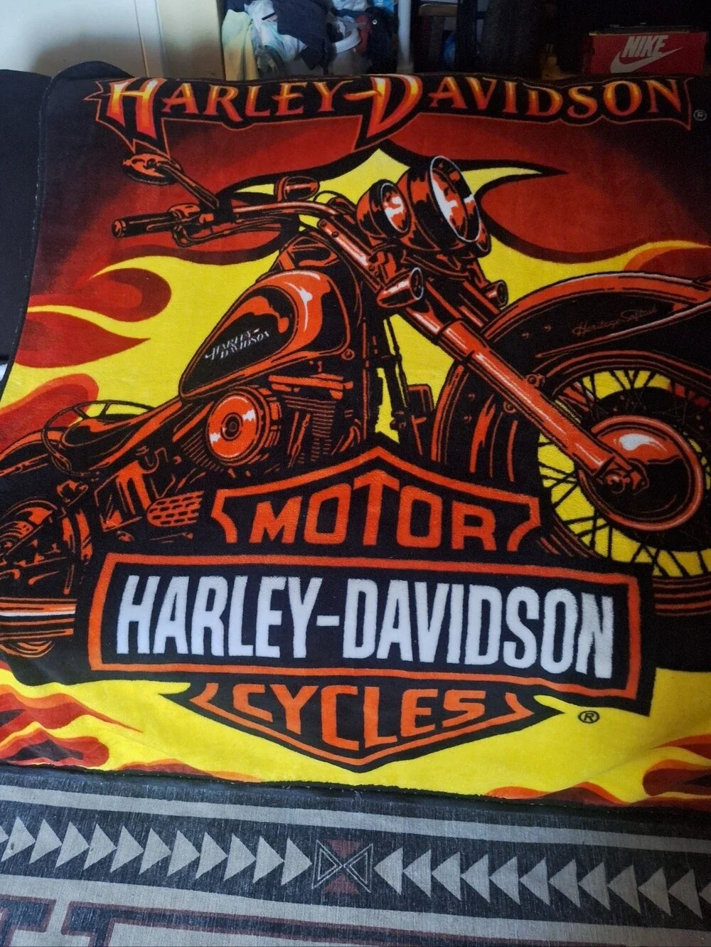 Harley Davidson Blanket in black and orange is a cozy and stylish addition.